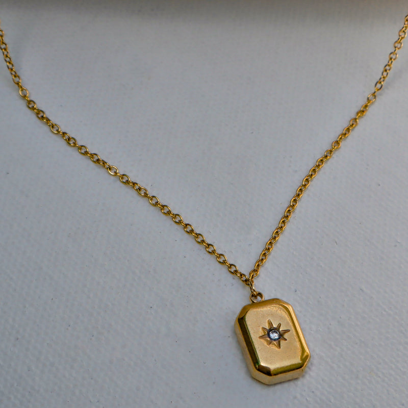 Engraved Starburst Tag Necklace