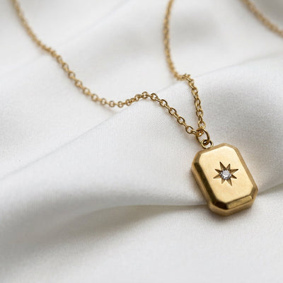 Engraved Starburst Tag Necklace